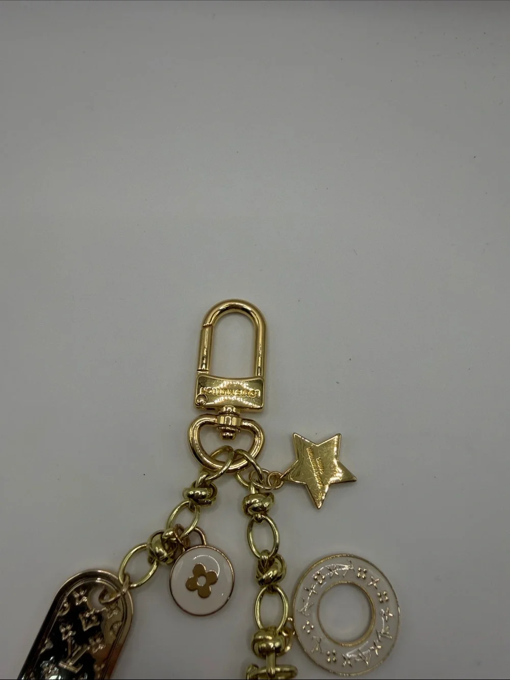 1416. Gold and Ivory Charm Key Holder